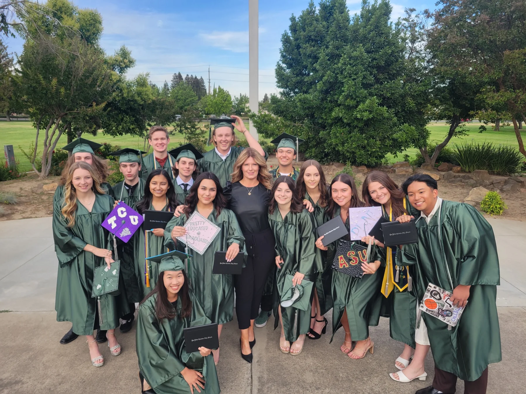 Libby Mays with Jim Elliot High School graduates